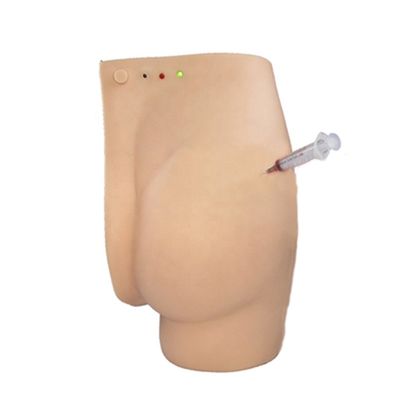 Dimostrazione di cura dei pazienti glutei Iniezione Simulatore didattico con luci di avvertimento